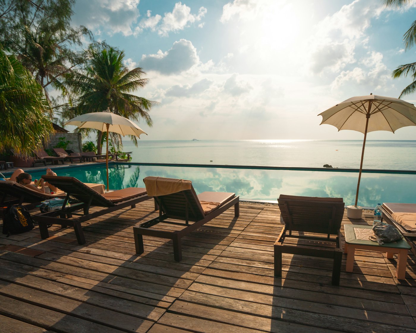 A resort pool deck at golden hour